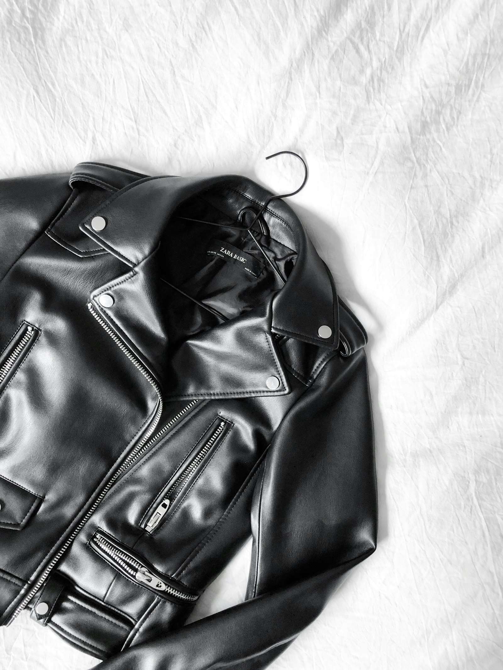 PU leather jacket on a hanger