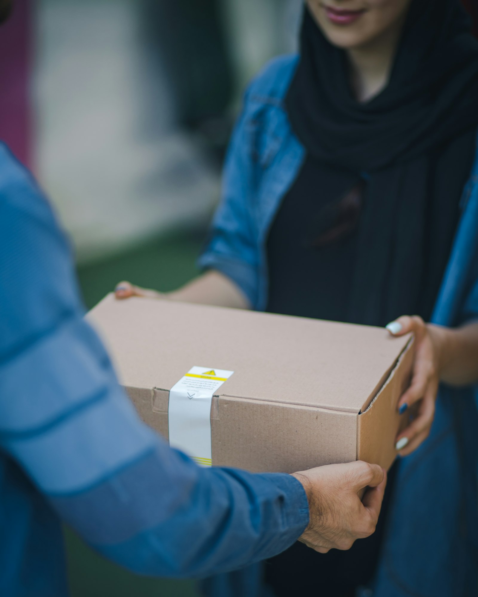 Shipping containers and parcels at a logistics hub